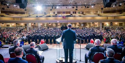 People at a large conference of police officers